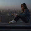 woman sitting alone
