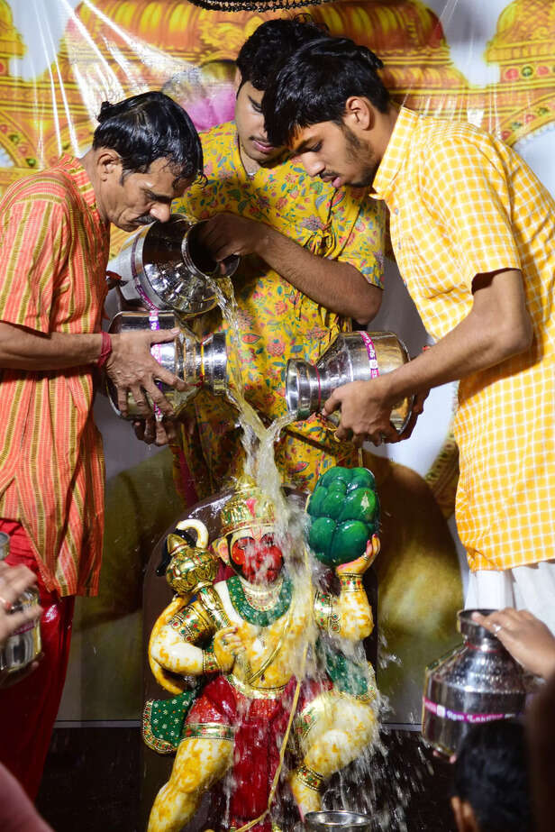 Bikaner, May 21 (ANI): Priests perform 'Abhishek' to Lord Hanuman with 1008 pots...