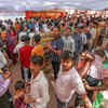 Prayagraj, Mar 30 (ANI)_ Devotees wait in queues to offer prayers to Goddess Alo....