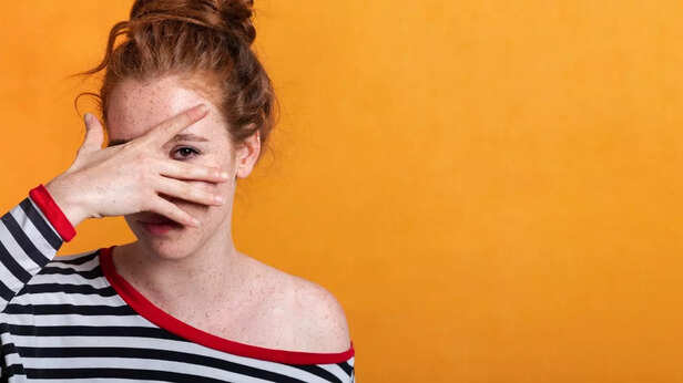 She hides her face but it’s the hormones that are the real culprit                          [image credits:Freepik]