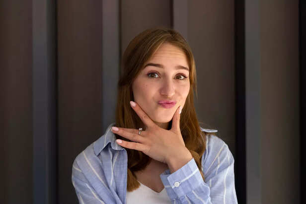 Woman with  thoughtful expression.