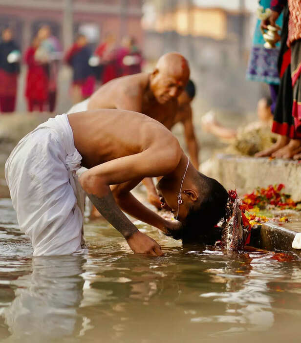 Vishnu’s Four Arms and Divine Symbols