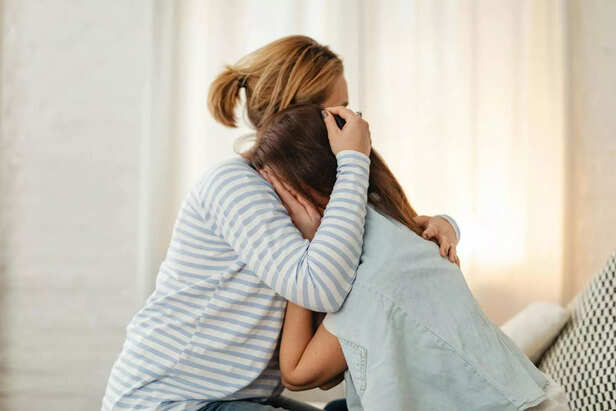 A child crying in a corner