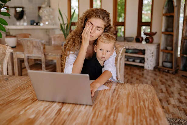 A parent stress while a child watches quietly