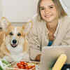 Pet dog and pet parent in kitchen