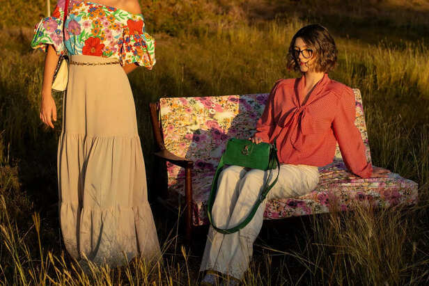 Woman in Long sleeve Blouse and Cream Pants