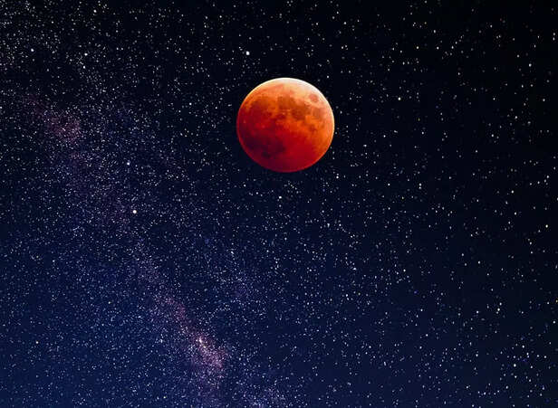 Blood moon in night sky