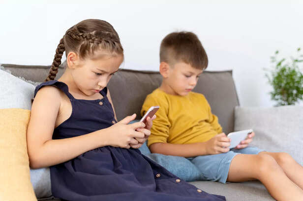 Kids using smartphone
