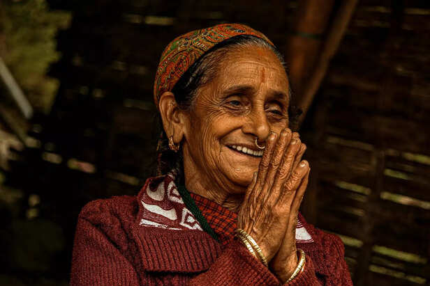 Close Up Photo of Elderly Woman with Her Hands Together