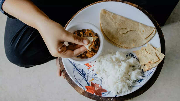 White Rice on White and Red Floral Ceramic Plate