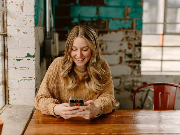 A woman texting on phone