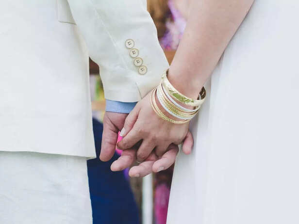 A couple holding hands