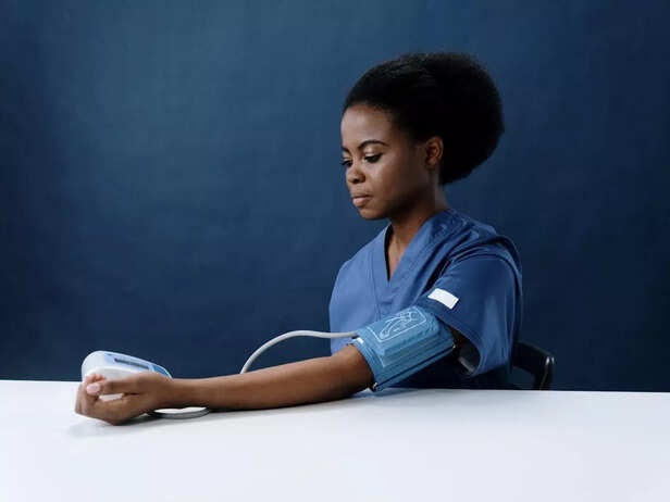 Woman checking her blood pressure