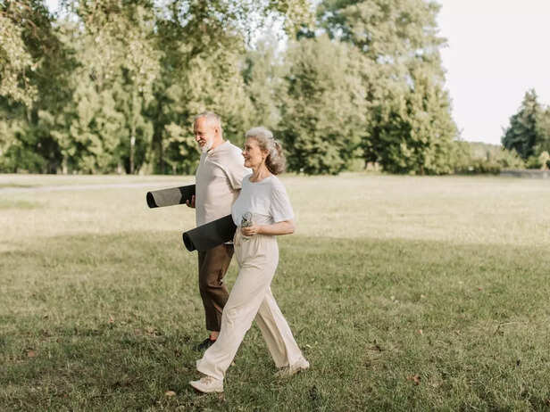 Old couple doing yoga