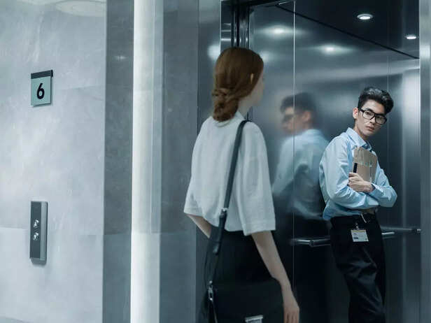 A woman entering the elevator