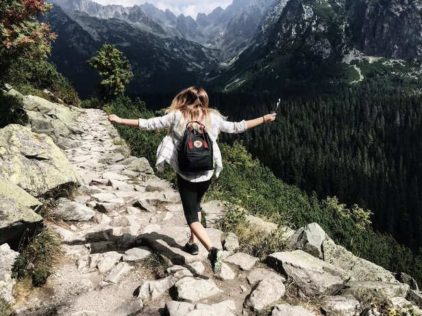 Travelers Hiking a Hidden Trail