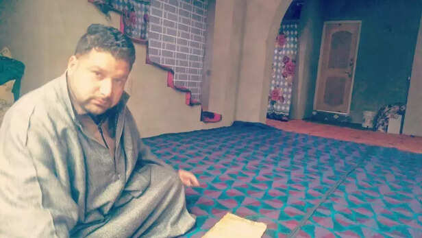 352336-javid-ahmad-shah-at-his-home-in-badaghar