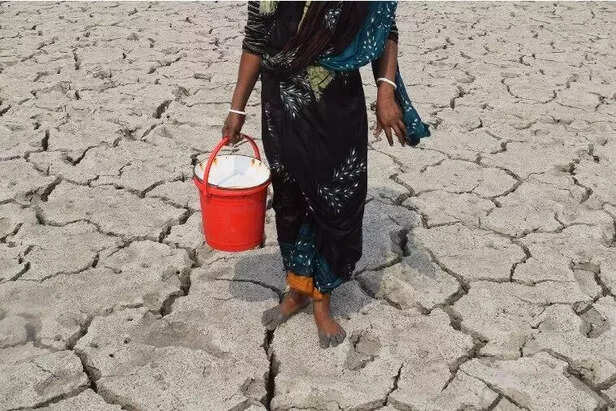 352057-these-women-have-to-collect-water-from-far-away