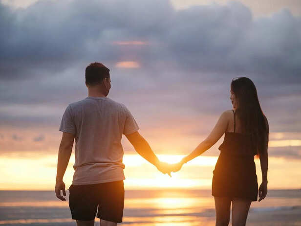 A couple holding hands