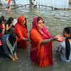 Devotees perform rituals during the Chhath Puja