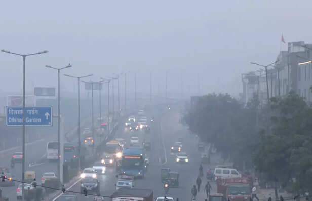 New Delhi, Nov 20 (ANI): Vehicles commute under dense smog as the Air Quality In...