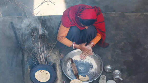 361454-women-cooking-on-chullah