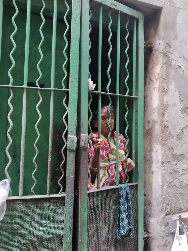 Lakhi-Das-60-a-worker-at-Sanjay-Printers-scaled