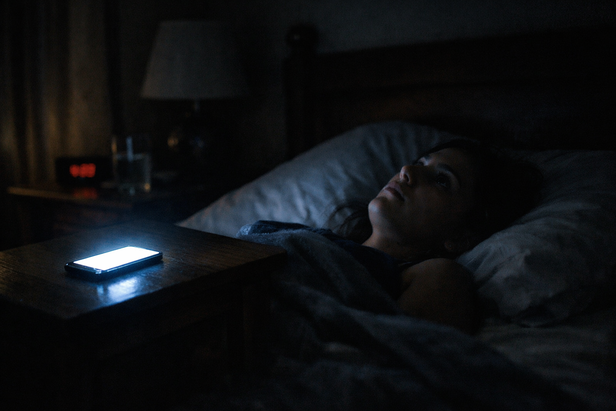 Phone screen dimly lit