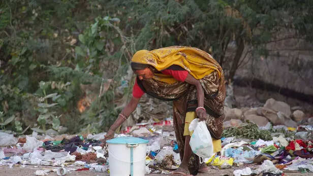 359217-female-sanitation-worker-picking-up-garbagebiomedical-wastecovidpxhere