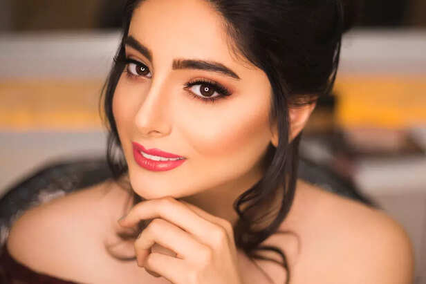 neatly groomed brows frame a perfect face