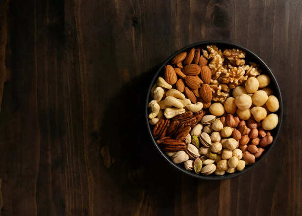 Aesthetic Bowl of Mixed Dry Fruits on Wooden Background