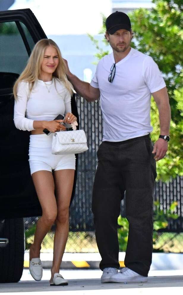 Backgrid | By the following day, the pair were spotted leaving Miami together, boarding the same flight out on December 28. Separate Christmases, shared exits. Message received.