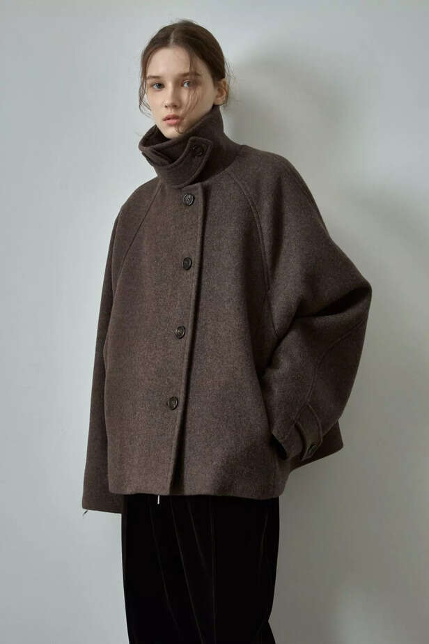 Pinterest | Funnel neck coats were one of this fall’s biggest outerwear trends and, according to Pinterest, they’re here to stay in 2026 as part of the "glamoratti" aesthetic.