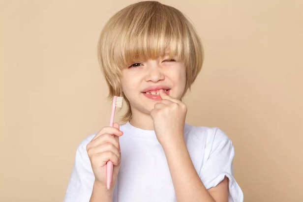 Toddler brushing teeth