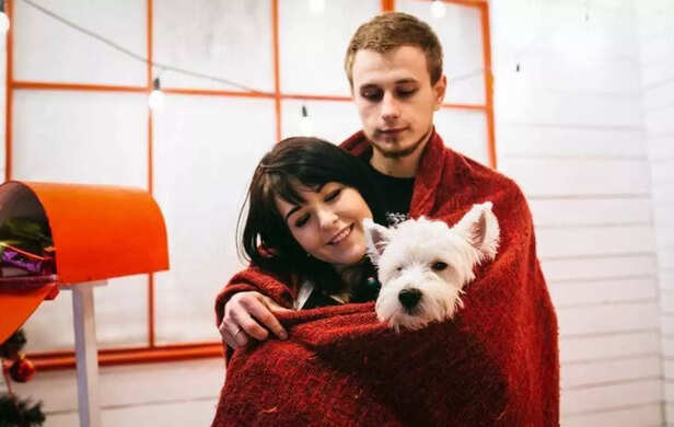 Owner relaxing, pet calm.