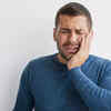 a person dealing with jaw pain