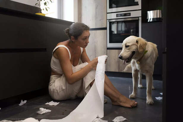 woman holding paper roll