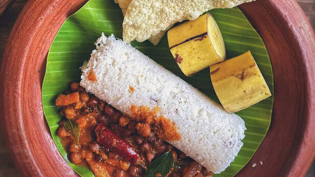 Puttu With Kadala Curry, Banana and Papad