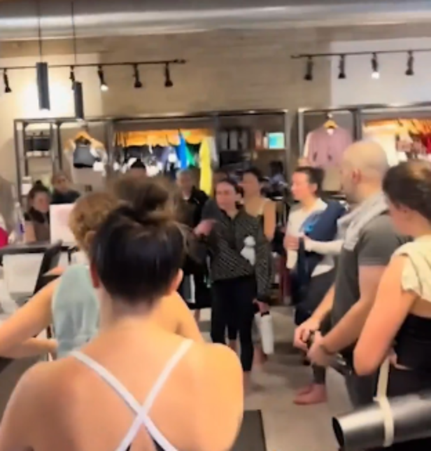 X| Members confront yoga studio over anti-ICE sign, chaos ensues.
