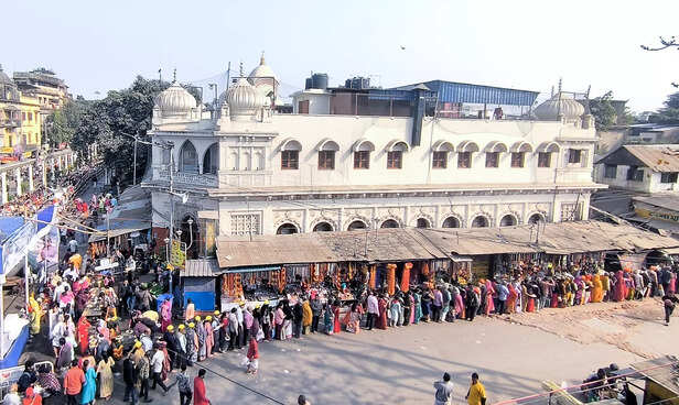 Kolkata, Jan 13 (ANI): Pilgrims stand in queue at Kalighat Temple, in Kolkata on...