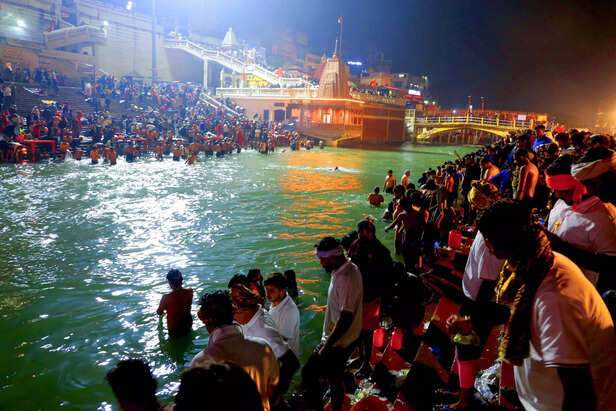 Haridwar, Feb 15 (ANI): Devotees arrive in large numbers to take a dip in the Ga...
