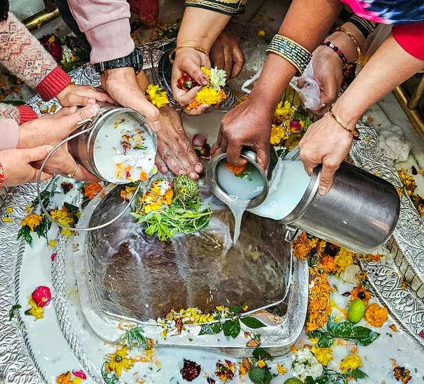 Jammu, Feb 15 (ANI): Devotees offer prayers to Shiva Linga at the Aap Shambhu Te...