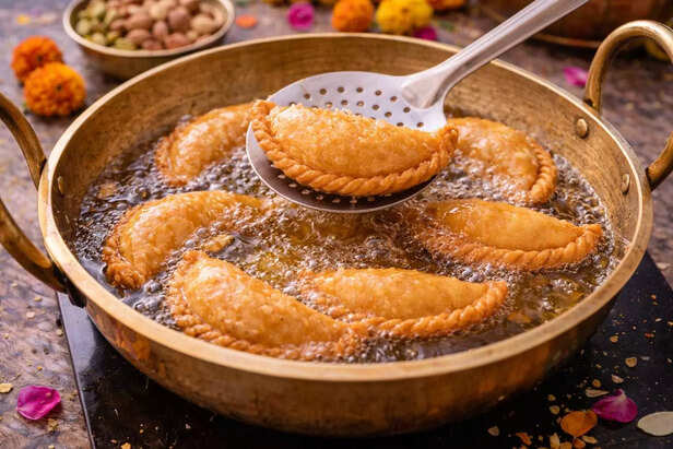 ​Frying Gujiya in Ghee