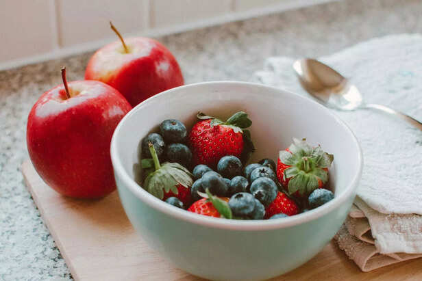 Fresh summer fruits and vegetables bowl