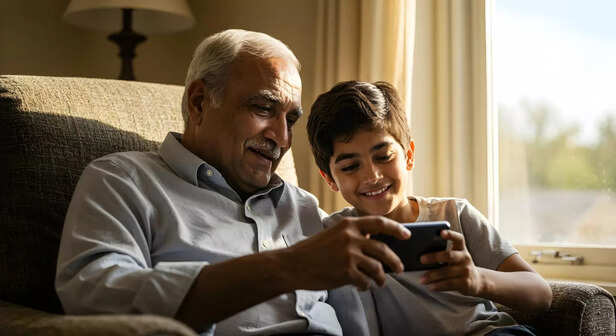 Grandfather and Grandson on Smart Phone