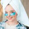 Person applying cold compress on eyes