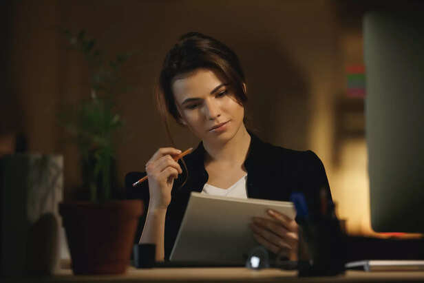 Person working with focus and dedication