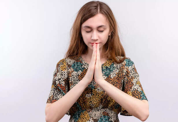 Hands forming a prayer gesture