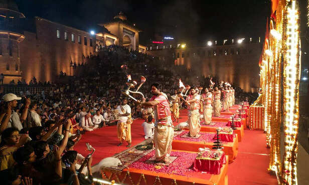 Varanasi, Mar 19 (ANI): Devotees participate in the grand Ganga Aarti on the aus...