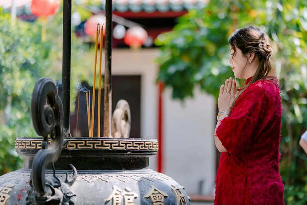 Calm prayer space with diya and incense